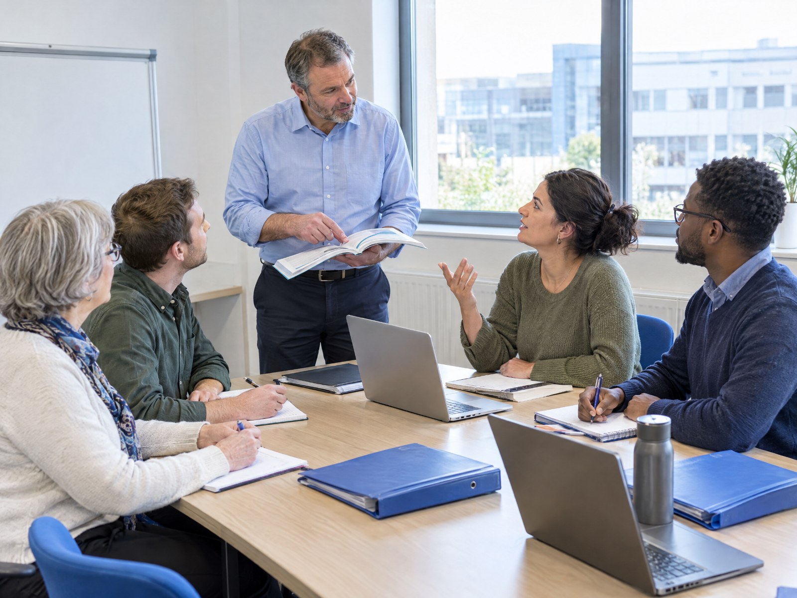 Public-service employees taking part in a practical professional-development workshop